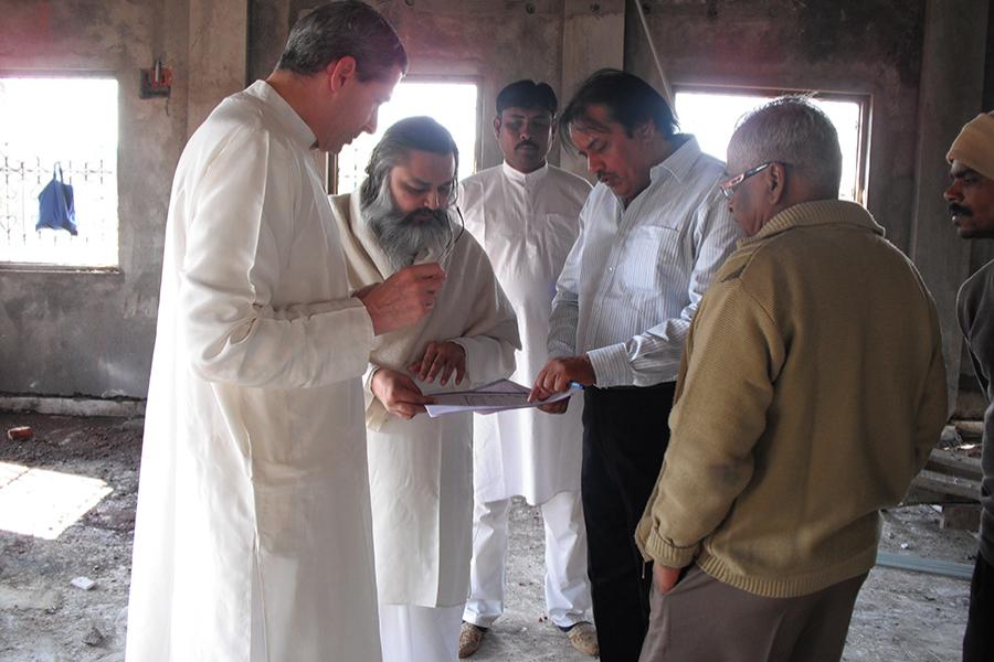 Brahmachari Girish Ji visiting Bijauri construction site with Dr. Harris
Kaplan, Contractor Shri Ajay Grover and Architect Shri Akerkar. December 2010